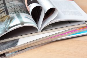 Pages of book curved into a heart shape, close up